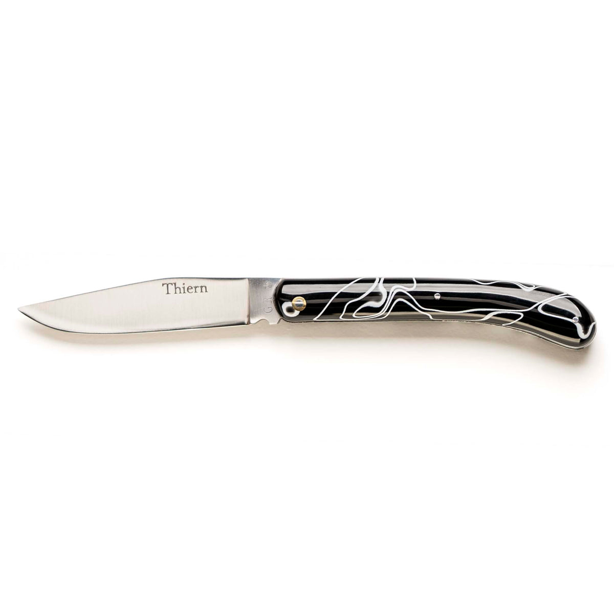 Thiern folding knife by Thiers-Issard with black and white acrylic pearl handle, open, side view