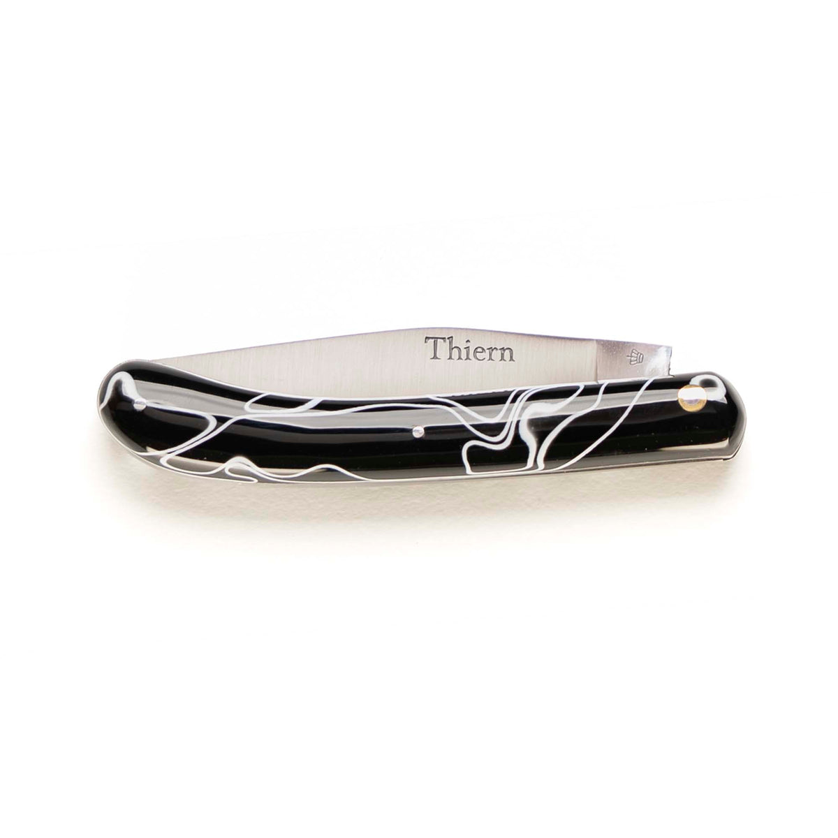 Thiern folding knife by Thiers-Issard with black and white acrylic pearl handle, closed